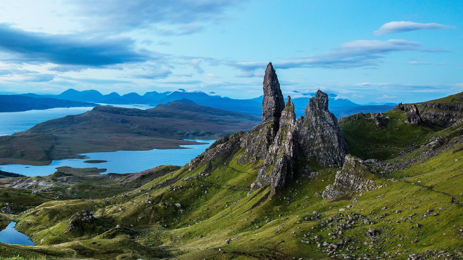 https://unsplash.com/photos/a-mountain-with-a-lake-in-the-middle-of-it-v75QJQRZPic